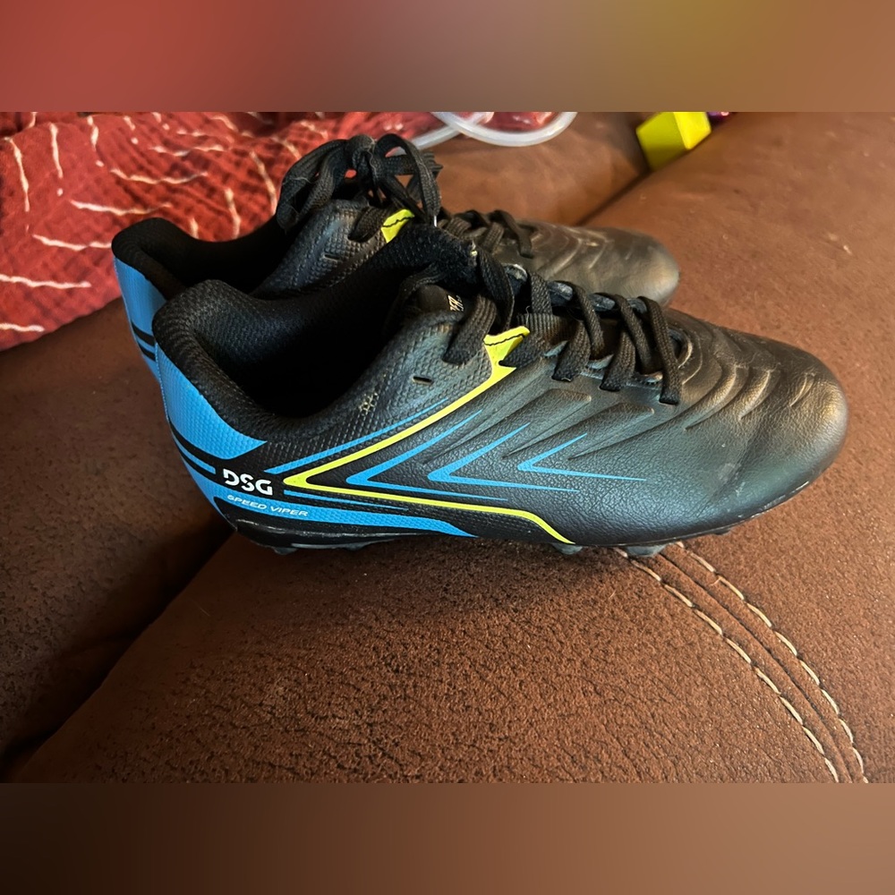 DSG Kids Soccer Cleats in Black, Blue, and Yellow